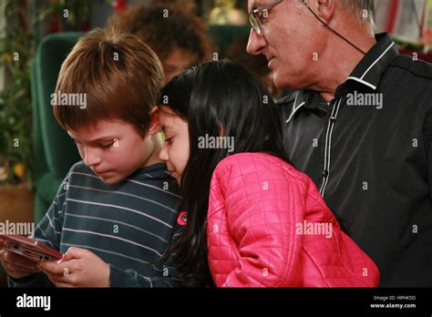 Kids Playing On A Game Console Stock Photo Alamy