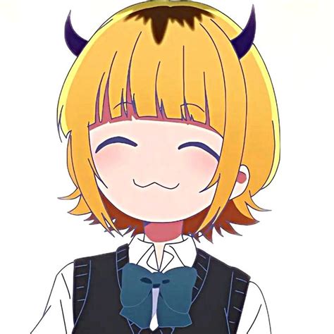 An Anime Character With Blonde Hair And Horns On Her Head Wearing A