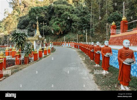 Row Of Statues Of Buddhist Monks Close To A Popular Tourist And