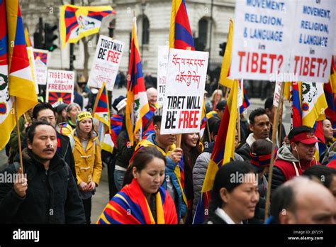 Tibetans And Supporters Of Tibet Take Part In A Demonstration Outside