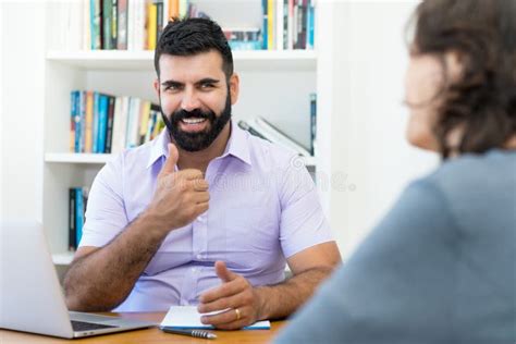 Happy Businessman Showing Thumb Up To Client Stock Photo Image Of