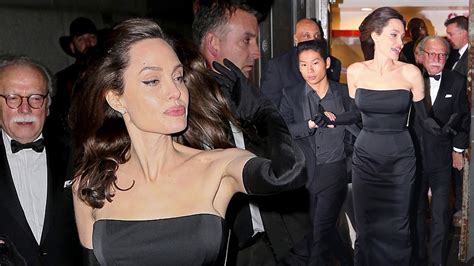 Giving The Cold Shoulder Angelina Jolie Wows In Black Strapless Gown