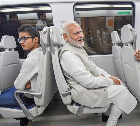 Pm Narendra Modi Takes Metro Ride In Delhi See Pictures News18