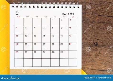 Calendario Del Escritorio De Septiembre De Sobre Fondo De Madera