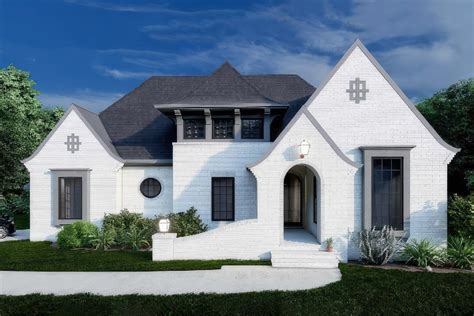 One Level Transitional Tudor House Plan With Bonus Room And Covered