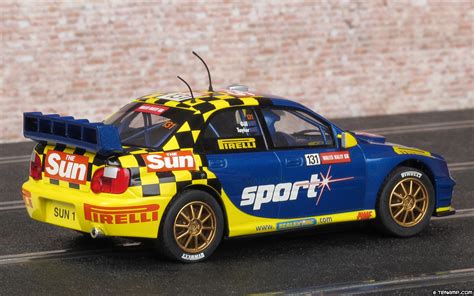 Scalextric C2550 Subaru Impreza WRC 131 The Sun Pirelli