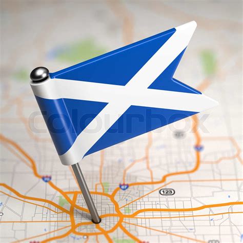 Scotland Small Flag on a Map Background. | Stock image | Colourbox