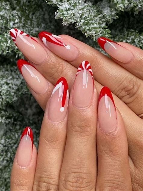 16 Playful Candy Cane Nails For A Festive Christmas Look The Ka Edit