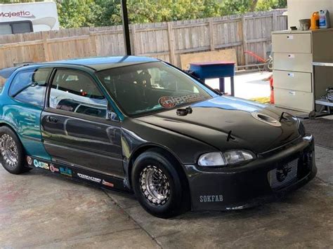 Black Honda Civic Hatchback In Garage