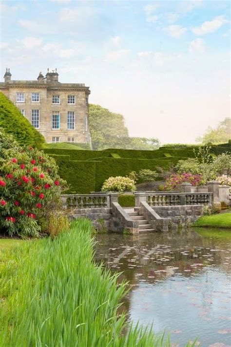 A Painting Of A House And Pond In The Middle Of A Garden With Flowers