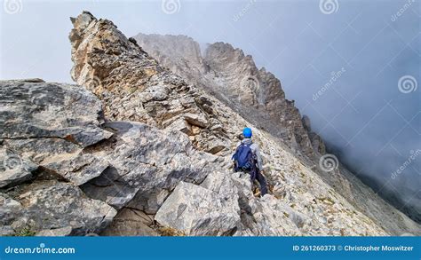 Man Trekking On Mystical Hiking Trail Leading To Mount Olympus Mytikas