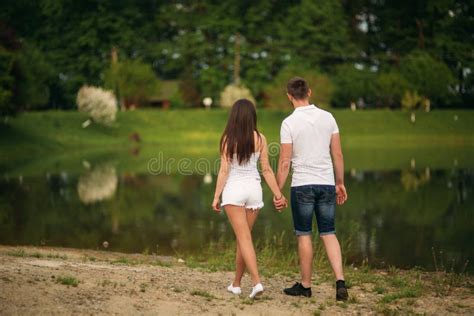 Couple In Love Hug Each Other Near The Lake Stock Image Image Of