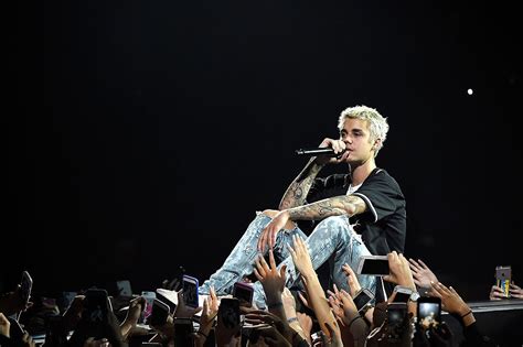 Justin Bieber Performs On Stage During His Purpose Tour At Madison