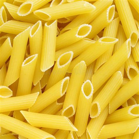 Golden Penne Rigate Italian Pasta Texture Background Stock Image