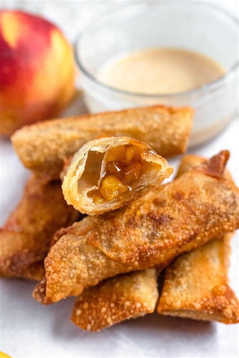 Delicious Peach Pie Filling Is Rolled Into Egg Roll Wrappers And Fried