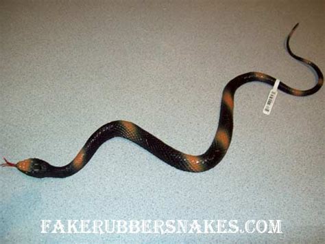 Straight Black And Tan Fake Plastic Snake