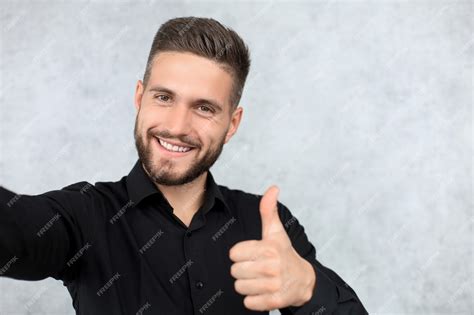 Premium Photo Photo Of Cheerful Handsome Young Man Standing Isolated