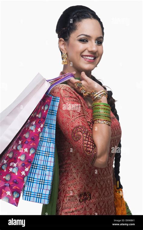 Woman Carrying Shopping Bags Stock Photo Alamy