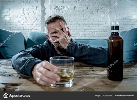 Sad Man Drinking