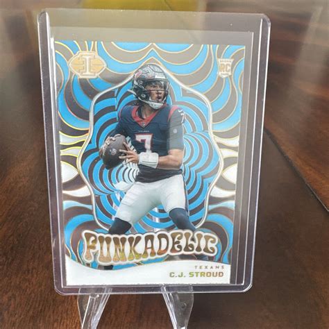 CJ Stroud 2023 Illusions 14 Funkadelic Light Blue 299 Price Guide