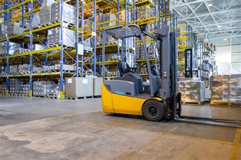 Premium Photo Interior Of A Modern Warehouse With Forklifts Pallet