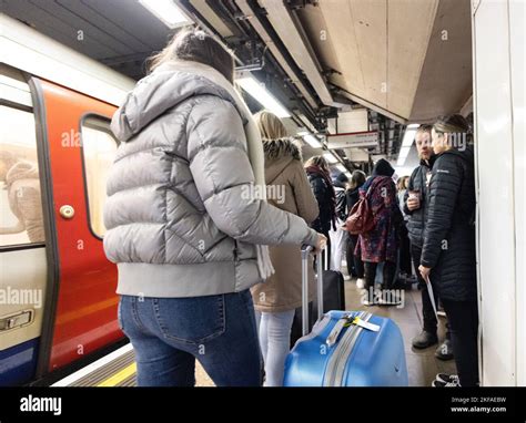 Crowded Platform On The London Underground Crowds Of Passengers With