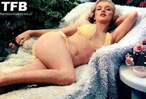 Marilyn Monroe Sexy Poses Showing Off Her Hot Figure Wearing A Yellow Bikini In A Photoshoot