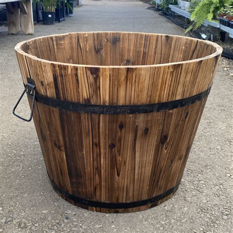 Half Whiskey Barrel Planter › Anything Grows