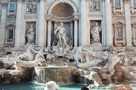 Trevi Fountain -- legend says that by throwing a coin in the fountain ...