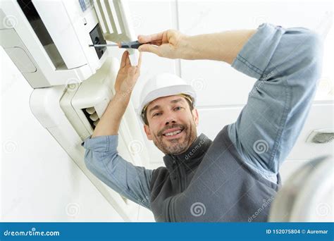 Happy Man Fixing Air Conditioning System Stock Photo Image Of