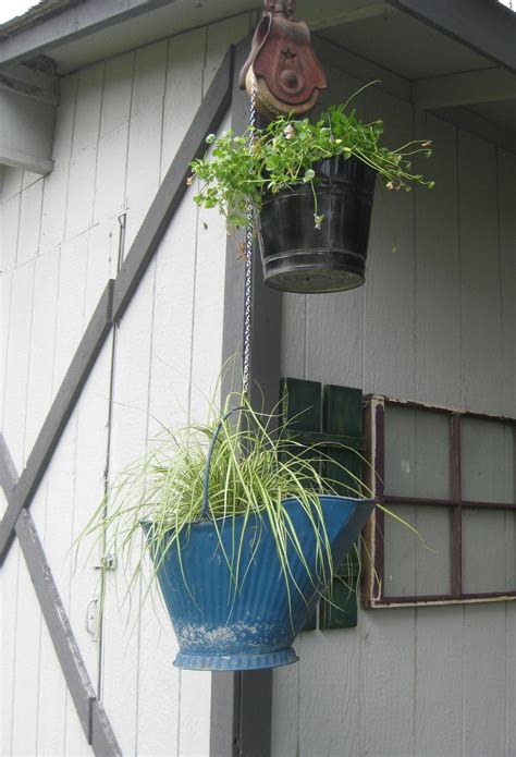 Garden Ideas Love This Old Pulley Hang Buckets As Planters And Its