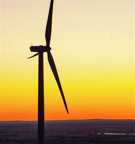 Wind Turbines On Field During Sunset Photograph By Cavan Images Fine