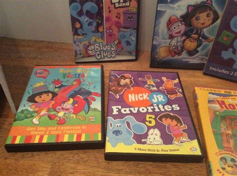 Lot Of 7 Nick Jr Dvds Dora Blues Clues Backyardigans Nihao Kilan Barney