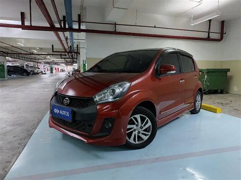 OLX Autos Daihatsu Sirion 1 3 Bensin AT 2015 Orange Mobil Bekas