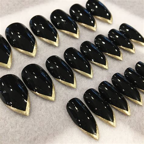 Matte Black And Gold Nails Stiletto