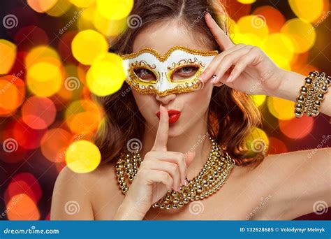 Beauty Model Woman Wearing Venetian Masquerade Carnival Mask At Party