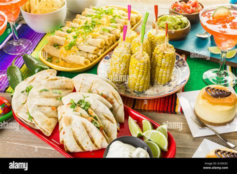 Fiesta party buffet table with traditional Mexican food Stock Photo - Alamy