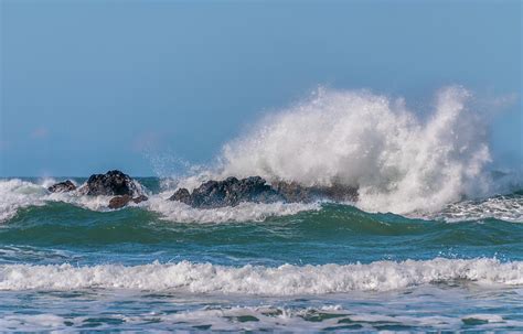 Wave Crashing Against Rocks Photograph By Marv Vandehey Pixels