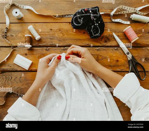 female dressmaker creating clothes  workshop stock photo alamy
