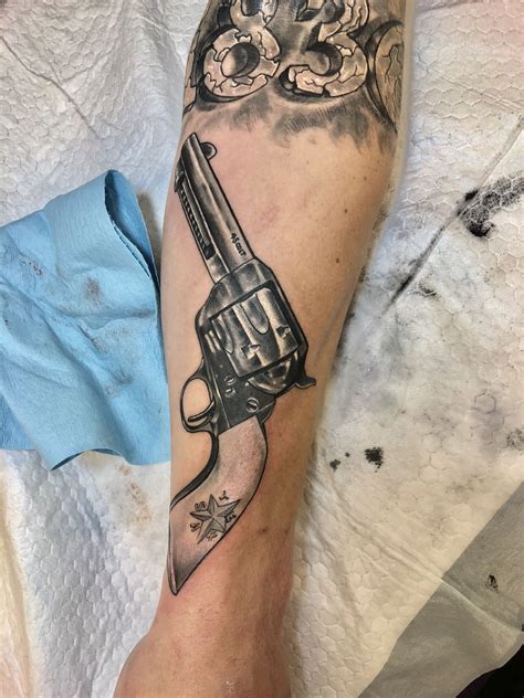 Detailed Revolver Tattoos