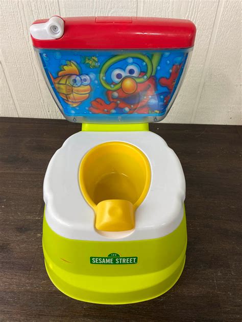 Kolcraft Sesame Street Elmo Adventure Potty Training Chair With Toilet