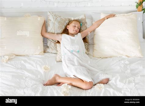 Girl Sleeping On The Bed Stock Photo Alamy