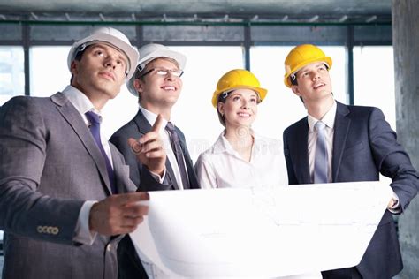 Diverse Group of Construction Workers Stacking Hands Stock Photo ... 