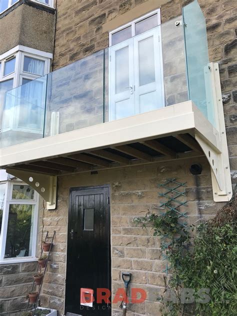 Modern Bespoke Metal Cantilevered Balcony With Frameless Balustrade