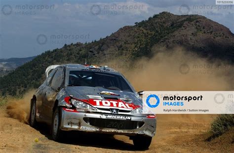 Gilles Panizzi Fra Peugeot Wrc In Action On Stage His Car