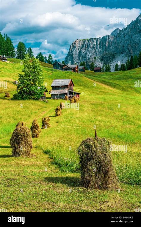 wooden huts in the dolomites Stock Photo - Alamy