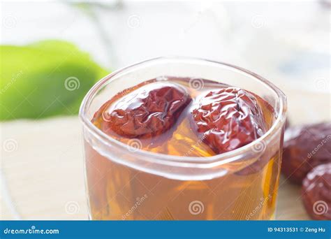 A Glass Cup Of Chinese Red Date Tea On The Table Stock Image Image