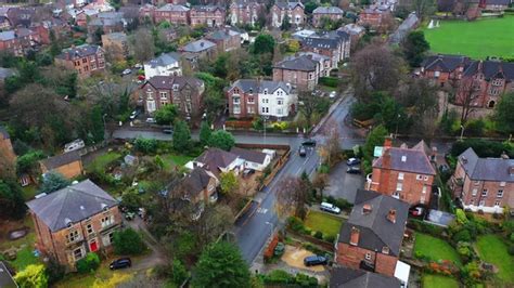 Aerial View Over Suburban Homes And Roads In Birkenhead Uk Stock Photo