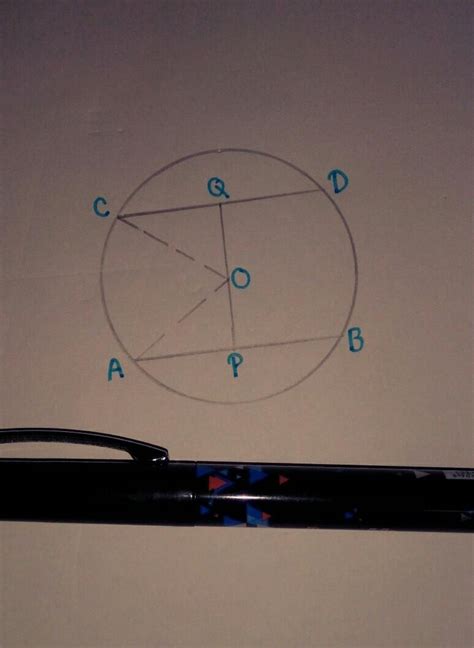 In The Given Figure AB And CD Are Two Parallel Chords Of A Circle With