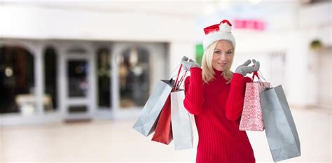 Premium Photo Composite Image Of Happy Festive Blonde With Shopping Bags